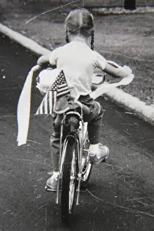 Fourth Of July Prints: Fine 1970s vintage black and white photography of kids joining a Fourth of July bike parade around the neighborhood