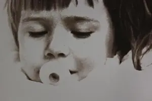 Anxious Prints: Fine black and white art photography from the 1970s of a Caucasian girl sucking on a pacifier