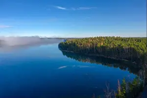Sky Clouds Prints: Finland landscape from the air with drone, lakes and pine forest. High quality photo