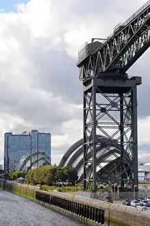 The Finnieston Crane With The Clyde Auditorium / The Armadillo In The Background On The River Clyde Glasgow Scotland