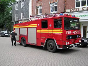 Fireman Prints: Fire Engine on Call Outside Shop in Tavistock Devon england United Kingdom UK