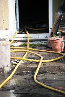 Reel Prints: Fire hosereel hose house front door severe gutted