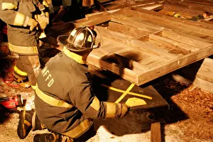 Quick Prints: Fire training of rescuing victims in a structure collapse using air bags and cribbing