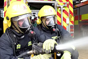 Firefighter Prints: Two firefighters with a hose
