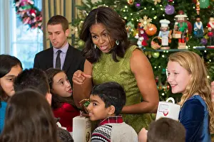 Obama Prints: First Lady Michelle Obama interacts with children at an event honoring military families at the White House