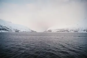 Brim Prints: Fjord between snowy mountains in the Lyngen Alps in northern arctic Norway