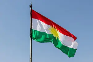 Kurdistan Prints: Flag of Kurdistan above Koy Sanjaq town, Kurdistan Region of Iraq