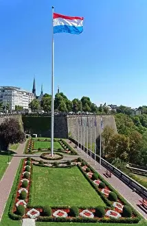 Benelux Prints: Flag Luxembourg, View of picturesque gardens at Place de la Constitution (Constitution Square)