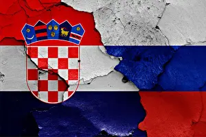 Breakup Prints: flags of Croatia and Russia painted on cracked wall
