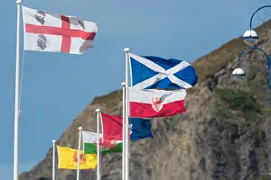 Aberystwyth Prints: Flags of minority European countries and small nations flying on the promenade at Aberystwyth Wales UK