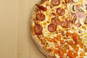 Fastfood Prints: Flat lay of tasty italian pizza on on cardboard box