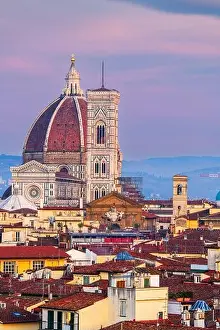 Florence, Italy skyline with landmark buildings of the Duomo at dusk