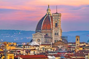 Florence, Italy skyline with landmark buildings of the Duomo at dusk