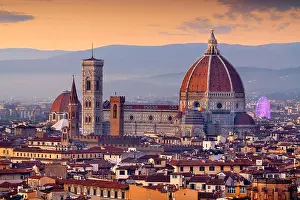 Florence, Italy skyline with landmark buildings at dusk over the Duomo