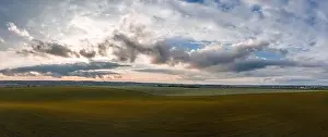 Beds Prints: Flying over a field of growing wheat. Aerial panoramic drone shot