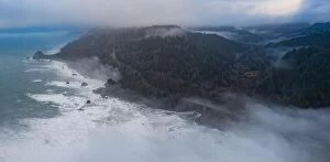 Aerial Landscape Collection: Fog drifts over the wild coastline of Northern California in Klamath