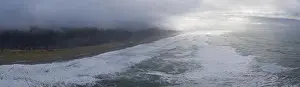Fog shrouds the forested coast of Northern California near Klamath. This region is known for its magnificent Redwood forests and rugged coastline