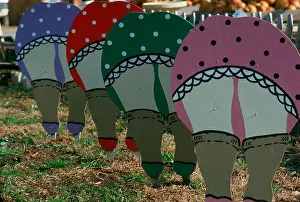 Bending Prints: Folk art cut outs of women bending over