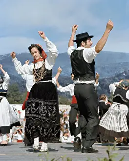 Costa Prints: folk dance couple in Regional costume in the Minho, Northern Portugal