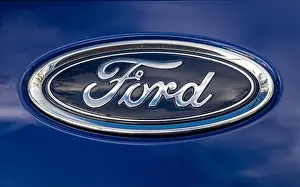Ford Prints: Ford Car badge on a blue background