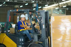 Parcel Prints: Forklift are loading into cargo containers at warehouses