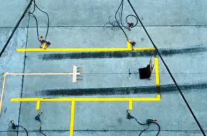 Marks Prints: A formula one pit box with skid marks