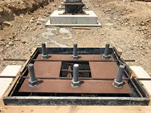 Screw Prints: Formwork and reinforcement of concrete reinforced foundation with metal anchor bolts designed for the installation of