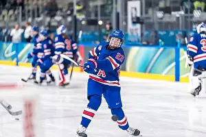 Hockey Prints: forward Tessa Janecke #22 of Team United States warms up before playing against Team Finland in the Preliminary Round