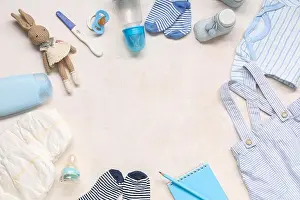 Toys Prints: Frame made of baby clothes, toys, pregnancy test and nipples on grunge white background