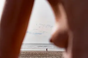 Gironde Prints: France, Gironde, close-upof woman's bosom on naturism beach