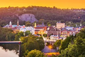 Frankfort, Kentucky, USA town skyline on the Kentucky River at dusk