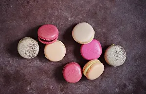 Assorted Prints: French assorted macarons cakes on a rectangular dish on a gray background