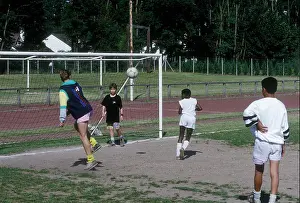 Practicing Prints: French students, gym class, playing soccer
