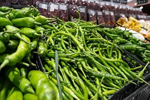 Natural Condition Prints: Fresh green bell peppers on the market offer a healthy and organic vegetable ingredient