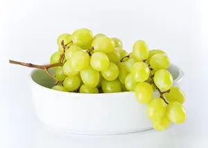 Pick Prints: Fresh green grapes in white bowl on white