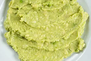 High Angle Prints: Fresh homemade guacamole sauce served on a white ceramic plate, top view