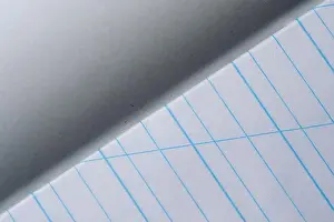 Mind Prints: Fresh notebook page displays neat blue lines inviting ideas and thoughts