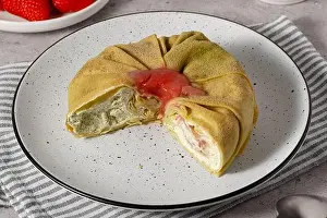 Tableware Prints: Fresh pancake cake with strawberry filling served with strawberries on a gray table