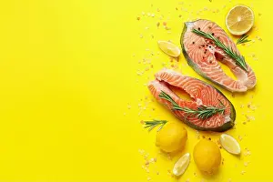 Fillet Prints: Fresh raw salmon and spices on yellow background
