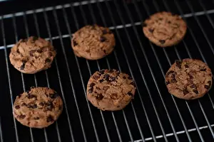 Indulgence Prints: Freshly baked homemade cookies cooling on a wire rack