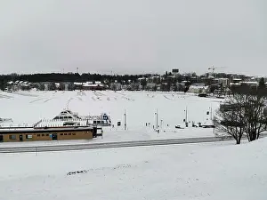 Wonderland Prints: Frozen harbor with snowy landscape during New Year 2026 season