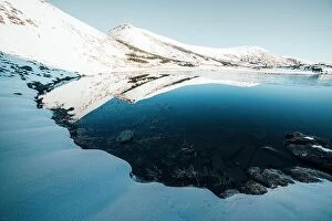 Images Dated 20th May 2016: Frozen mountain lake with blue ice