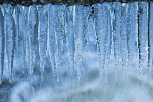 Chill Prints: Frozen waterfall with blue ice in winter