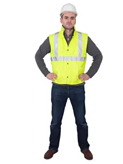 Headwear Prints: Full-length portrait of engineer with hard hat and yellow reflective safety vest