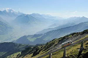 Vastness Prints: Funicular railway Muelenen-Niesen Kulm with the longest staircase in the world serving as an emergency escape
