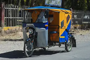Funny moped taxi in Cusco Peru