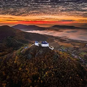 High Hill Prints: Fuzer, Hungary - Aerial view of the beautiful Castle of Fuzer with amazing colorful golden sunrise