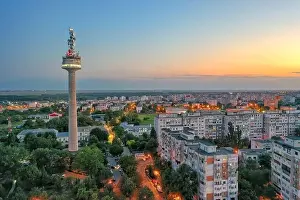 Galati, ROMANIA - July 22, 2021: Aerial view of Galati City, Romania. Night city lights after sunset at blue hour
