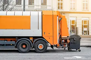 Copyspace Prints: Garbage disposal lorry at city street