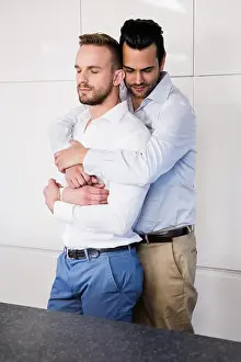 Homey Prints: Gay couple with eyes closed hugging